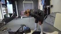 Watch Sandra cleaning the Studio wearing shiny nylon Rainwear and white Rubberboots