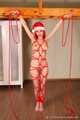 Morrigan - Red-haired girl in Santa’s hat pampers guys with bondage session