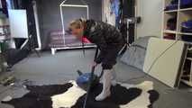 Watch Sandra cleaning the Studio wearing shiny nylon Rainwear and white Rubberboots