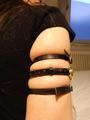 Tight little leatherstraps and a little upper arm wrist watch around Ranias soft upper arms.