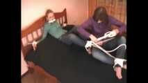 Catt and Alexa - Naughty girl tied up before joining helpless girlfriend on the bed (video)