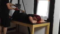 Aurora hogtied on table 1/2