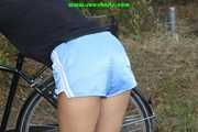 Watch Sandra riding her bike enjoying her shiny nylon shorts