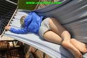 SEXY Sonja wearing sexy shiny nylon shorts enjoying the sun and the shorts in a hammock (Pics)