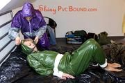 Pia tied and gagged by Sophie both wearing a shiny PVC sauna suit (Pics)