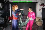 Ronja and Stella destroying shiny nylon rainwear both wearing that stuff (Pics) Part 2