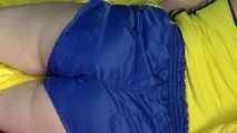 *** Sexy MIA wearing a blue shiny nylon shorts and a yellow top during changing the cloths on her bed  (Video)***