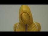 03:00 Min. video with Jill tied and gagged in a shiny nylon yellow rainsuit