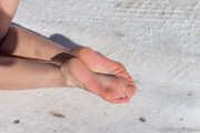 Claudia barefoot in snow