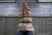 Miss Amira in 2 Hunter rain jackets and nylon rain pants gets tied up and gagged