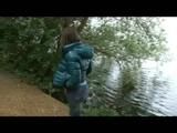 Alina walking on a lake wearing sexy shiny nylon shorts under her jeans and a down jacket (Video)