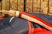 Mara tied, gagged and hooded on a princess bed wearing sexy oldschool downwear in blue/red/white (Pics)