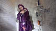 Sexy Sandra during her shaving cream action in the shower wearing a sexy blue shiny nylon rain pants and a shiny nylon purple rain jacket (Video)