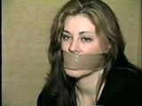 26 YEAR OLD RIVER VERY TIGHTLY WRAP TAPE GAGGED, PANTYHOSE FEET TICKLED, STUFFED MOUTH & DROOLING (D52-8)