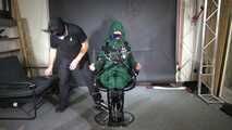 Marie M. taped and gagged in shiny nylon rainwear