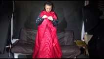 Watching Mara preparing her sofa with shiny nylon cloth wearing a sexy rainwear combination (Video)