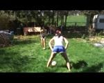 Jill and a friend of her playing soccer in the garden while wearing shiny nylon shorts (Video)