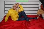 Get 243 pictures of Nina in shiny nylon Rainwear from 2008-2012 in one package!