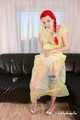 Morrigan - posing in yellow trash bag dress