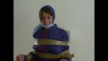 3sets of short videos with Katharina tied and gagged and hooded on a chair wearing shiny nylon rainwear (Video)