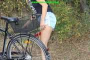 Watch Sandra riding her bike enjoying her shiny nylon shorts