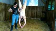 Slave torment of the jeans and rubber boot mistress in the stable