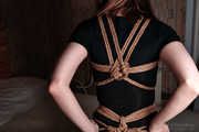 Posing in tight jute shibari