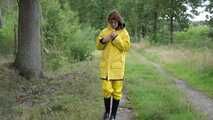 Miss Petra goes for a walk in friesennerz, yellow rain dungarees and rubber boots (looped version)