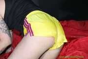 Watch Pia in her special yellow shiny nylon Shorts