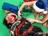 [From archive] Masha More and Malika - packed in trash bags with red duct tape like New Year presents 02