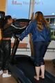 Stella and Leonie during their workout on the treadmill both wearing shiny nylon rainwear (Pics)