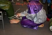 Pia tied and gagged by Sophie both wearing a shiny PVC sauna suit (Pics)