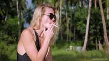 Glamour lady is smoking 120mm Saratoga in the jungle