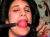 19 Yr OLD LATINA HOUSEWIFE IS BALL-GAGGED, CHAIR TIED, HANDGAGGED WEARING LINGERIE, NYLONS & HEELS (D63-16)