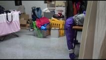 Jill tied and gagged on a table wearing a shiny purple/silver PVC sauna Suit (Video)