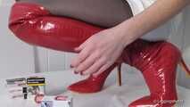 Crushing in red Overknees on table