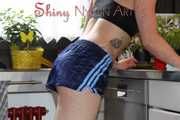 Watching sexy COURTNEY wearing a darkblue shiny nylon shorts and a top while preparing coffee and doing her housework (Pics)