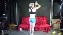 Watching ***NEW MODELL COURTNEY*** wearing a sexy lightblue shiny nylon shorts and a black top being tied and gagged overhead with ropes and a ballgag (Video)