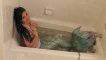 Mermaid in Captivity Flirts with Fisherman - Starring Loren Chance