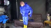 Watching sexy Pia wearing sexy blue shiny nylon rainwear and yellow rubber boots raking leaves (Video)