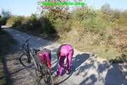 Watch Sandra enjoying her shiny nylon Suit riding a Bike