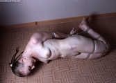 Amanda hogtied nude on floor