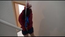 Jill tied and gagged over head wearing a sexy darkblue shiny nylon shorts and a red rain jacket (Video) 