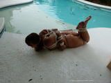 Poolside Hogtie in sunny Florida