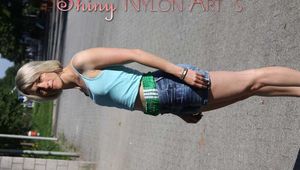 Sonja wearing a sexy jeans shorts over her green shiny nylon shorts while walking through the street lateron she takes the jeans off (Pics)