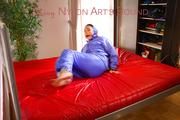 Jill ties, gagges and hoodes herself on bed wearing a supersexy lightblue downwear comnbination (Pics)