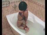 Rozanka - Sweet chick experiences bondage in the bathtub (video)