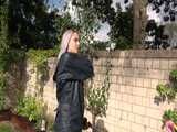 Watch Chloe gardening in her shiny nylon Rainwear