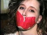 24 YEAR OLD ERICA IS SEMI CLEAR TAPE GAGGED, BALL-TIED WITH ELECTRICAL TAPE & CLEAVE GAGGED (D54-12)