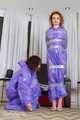 Terry and Vanessa - Terry in raincoat is taped and teased by Vanessa